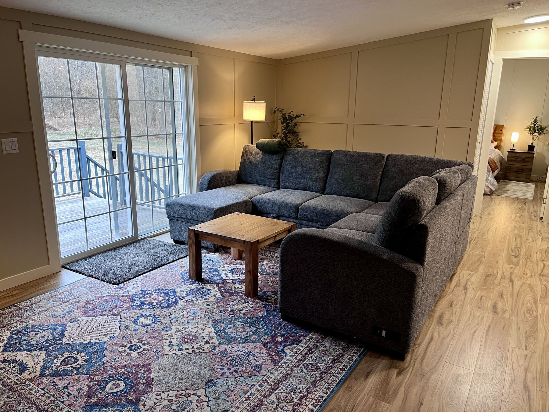 Living room with sliding door to the deck